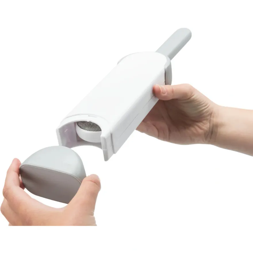 Двостороння щітка для очищення від шерсті Trixie Lint Brush з очищувальною базою, біла/сіра 33 см